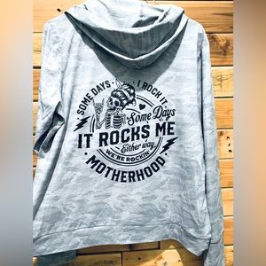 Motherhood pullover with hood. Size medium with Design on back.